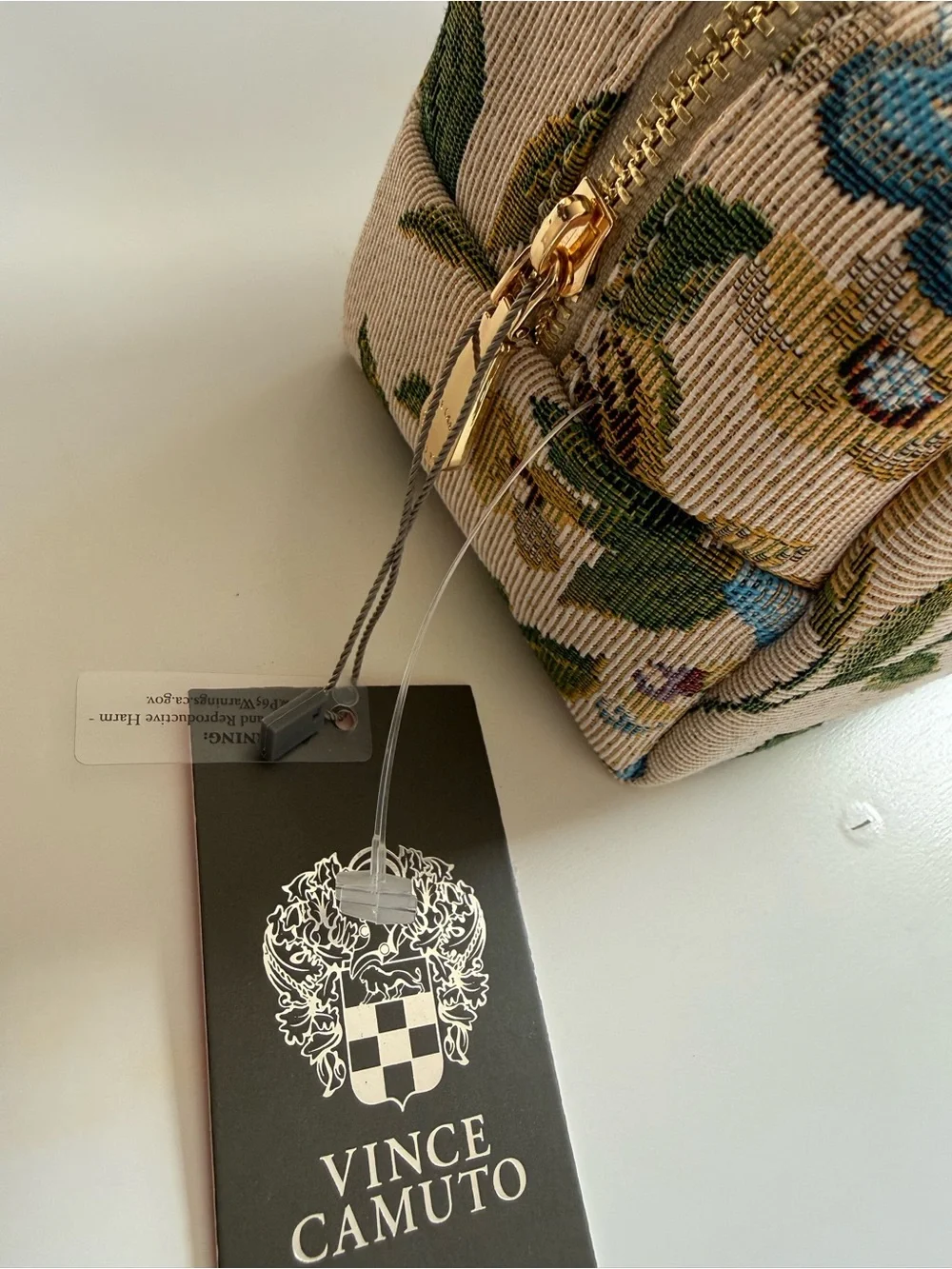 Vince Camuto tapestry cosmetic